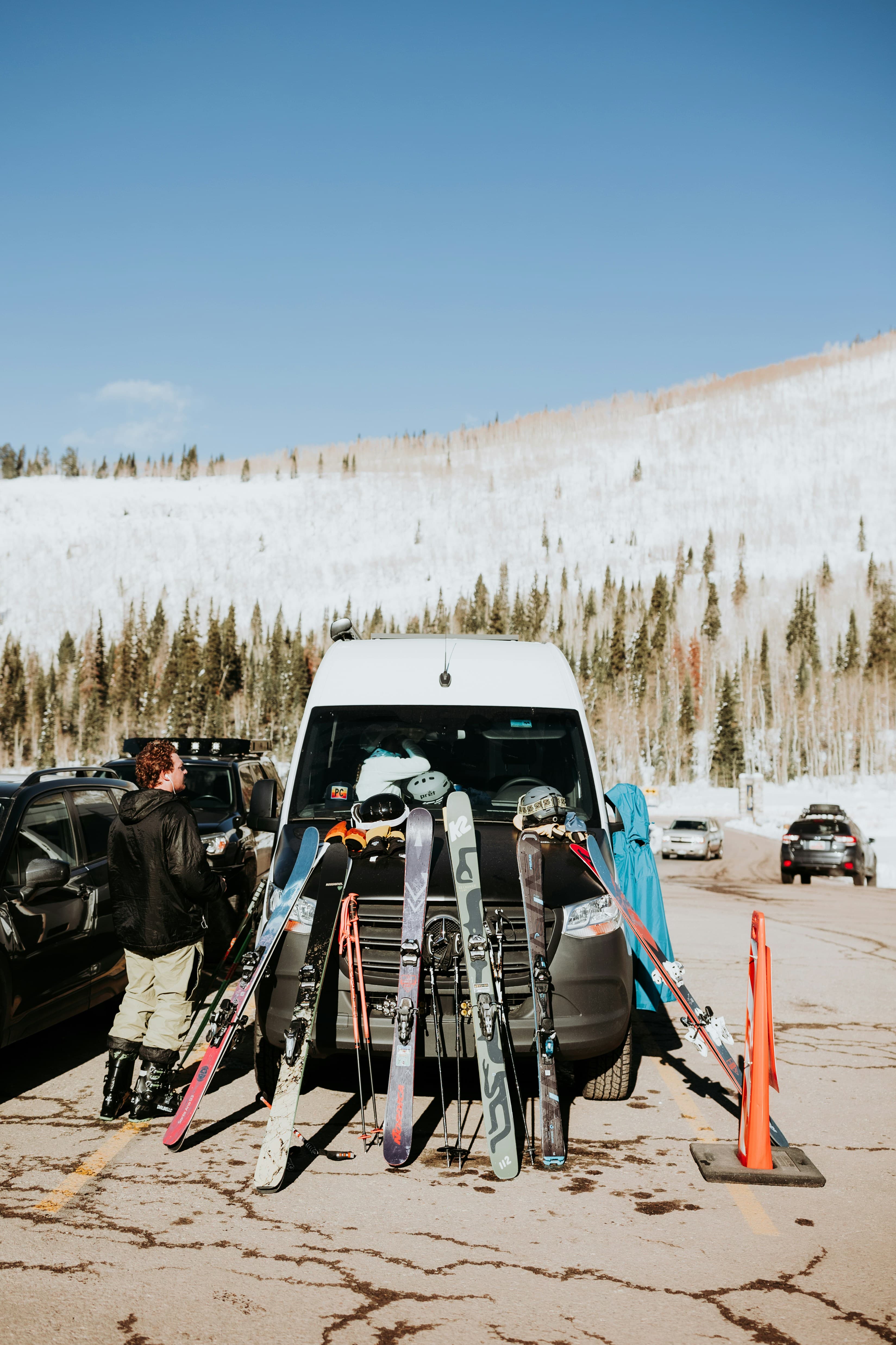 Friends loading skis